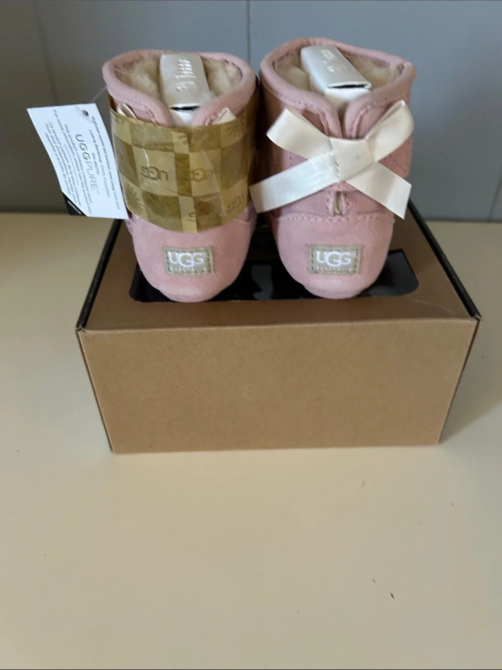 UGG Kids Pink Suede Booties with Bow Detail